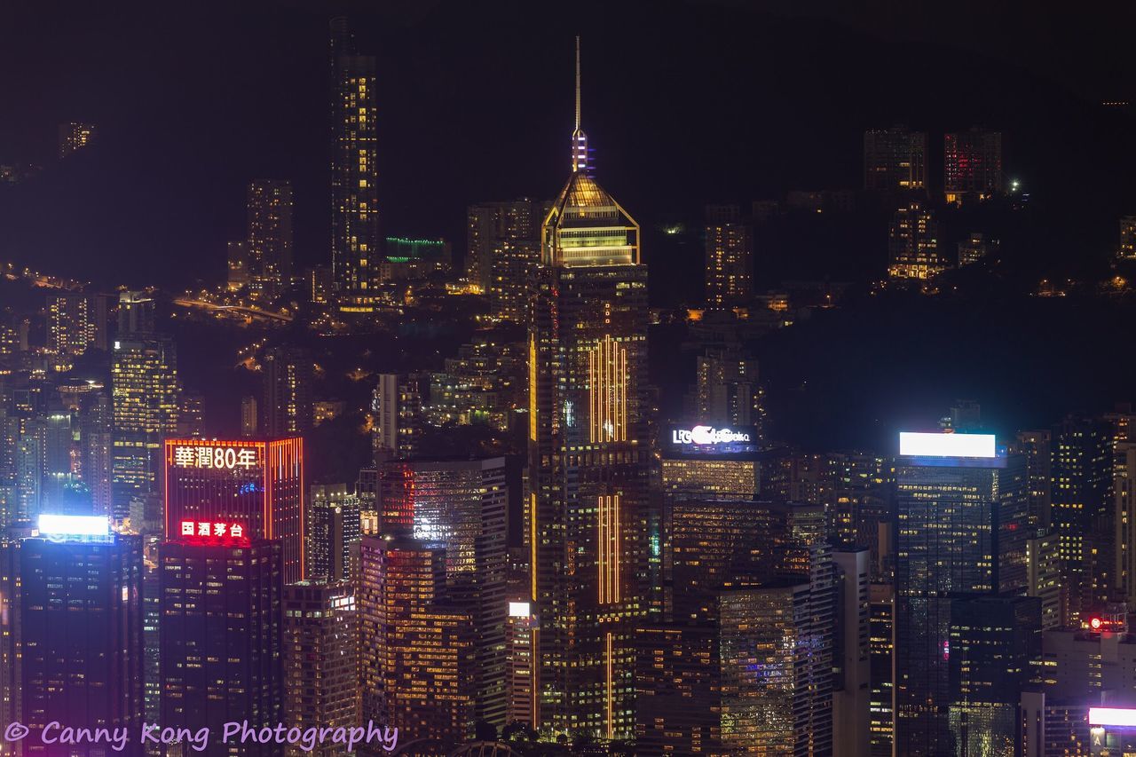 building exterior, architecture, built structure, night, illuminated, city, building, skyscraper, office building exterior, cityscape, tall - high, tower, modern, no people, travel destinations, office, residential district, landscape, outdoors, financial district, spire, light