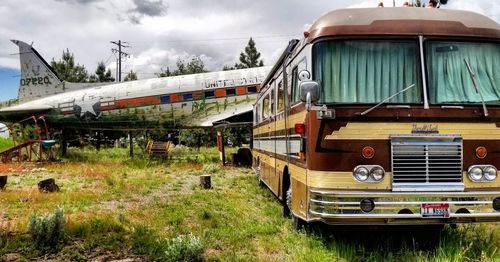 Train on field against sky