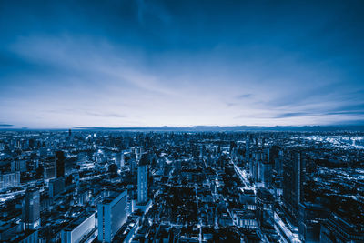 High angle view of buildings in city against sky during winter