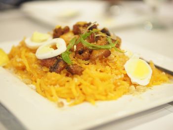 Close-up of served food in plate