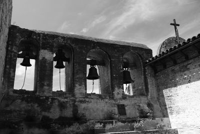 Low angle view of old building against sky