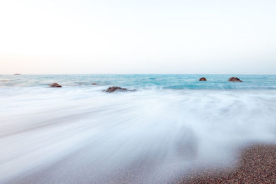 Scenic view of sea against clear sky