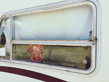 Red seen through open window