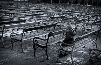 High angle view of people sitting on bench