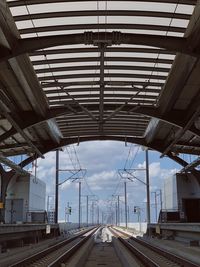 Railroad station platform against sky