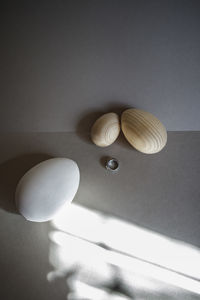 Low angle view of eggs on table at home