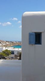 View of buildings against blue sky