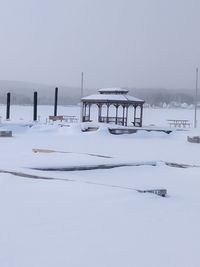 Scenic view of landscape against sky during winter