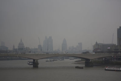 Bridge over river in city