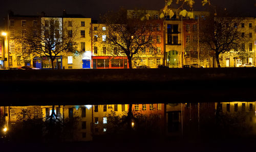 Illuminated cityscape at night