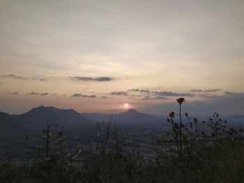 Scenic view of mountains against sky during sunset
