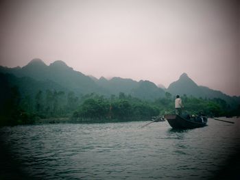 Boats sailing in sea