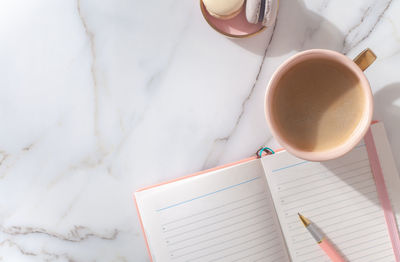 High angle view of coffee cup on table