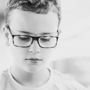 Close-up of boy wearing eyeglasses