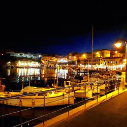 High angle view of illuminated harbor at night