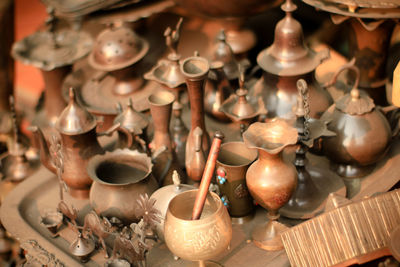 High angle view of antique objects for sale