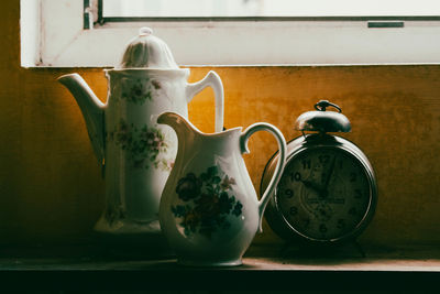 Close-up of teapot on table