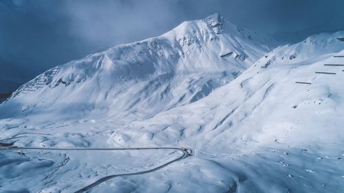 Snowcapped mountains against sky