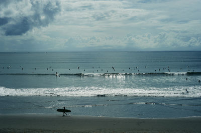 Scenic view of beach against sky