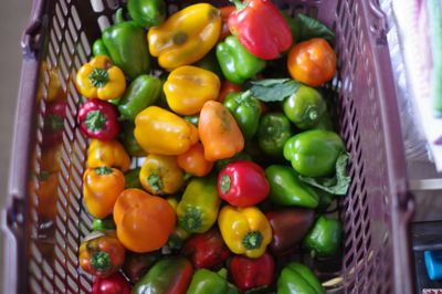 High angle view of bell peppers in basket