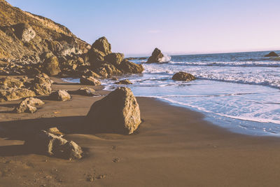 Scenic view of beach against sky