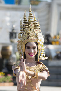 Beautiful young woman wearing traditional costume