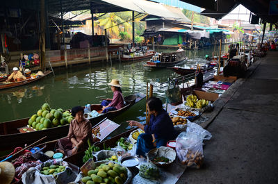 Group of people at market stall