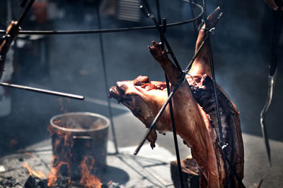 Close-up of meat on barbecue grill