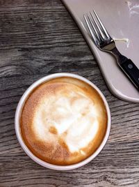 Close-up of cappuccino on table