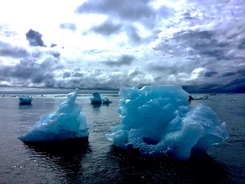 Scenic view of frozen sea against sky