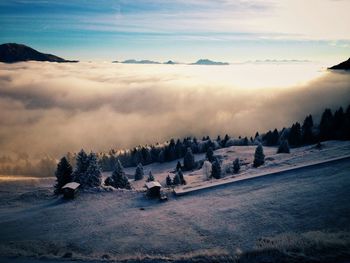 Scenic view of landscape against sky during winter