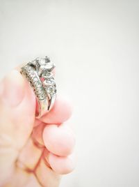 Close-up of hand holding christmas tree