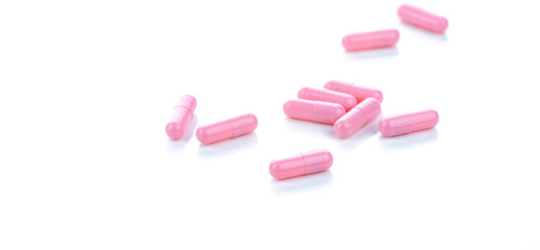 Close-up of capsules on white background