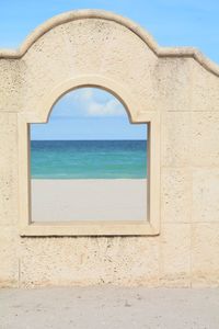 Scenic view of sea against blue sky