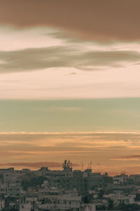 High angle view of townscape against sky during sunset