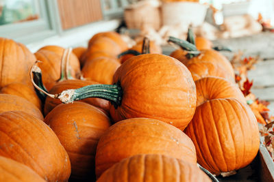 Close-up of pumpkins for sale at market stall