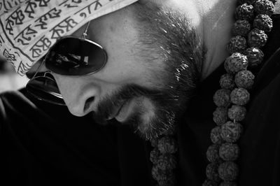 Close-up of bearded man wearing sunglasses outdoors