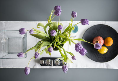 Close-up of purple flowers on table