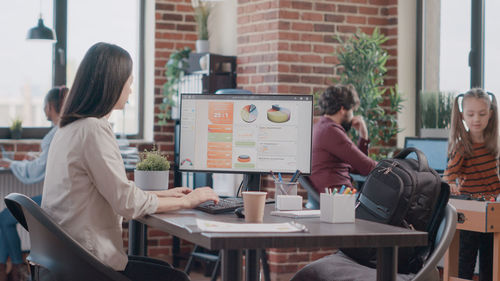 Business colleagues working in office