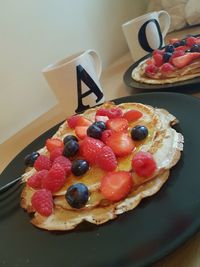 High angle view of strawberries in plate