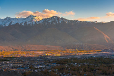 Scenic view of snowcapped mountains against sky