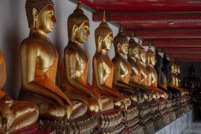 Statue in temple outside building