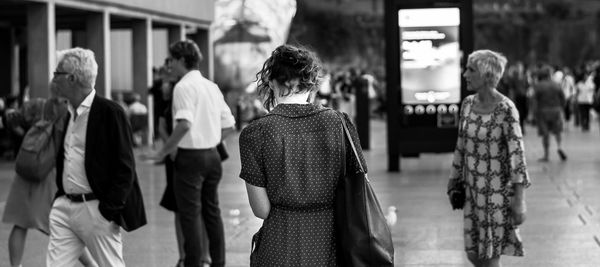 Rear view of woman walking outdoors