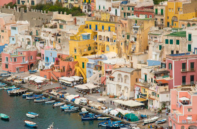 High angle view of boats moored at harbor