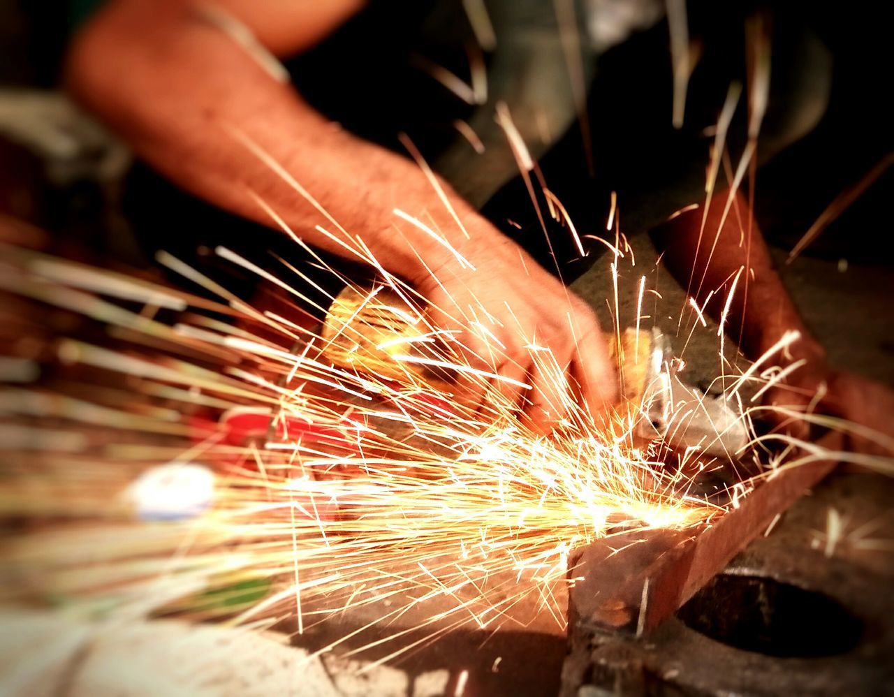 MIDSECTION OF MAN WORKING AT NIGHT