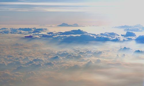 Aerial view of clouds in sky during sunset