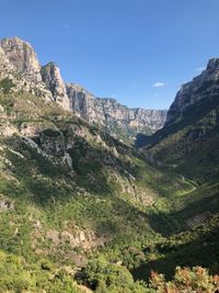 Scenic view of mountains against clear sky