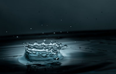Close-up of drop splashing in water