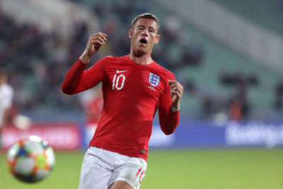 Man playing soccer on field