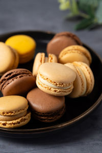 Close-up of macaroons in plate on table